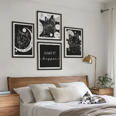 Wall art set featuring black cats, moon, and planet