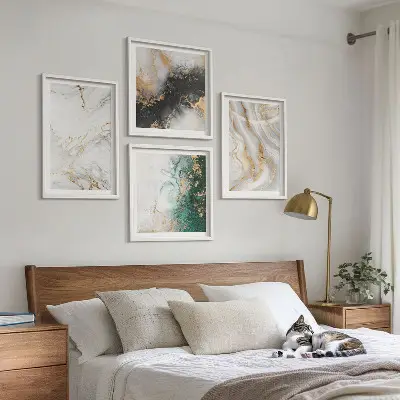 Multi-piece wall art set with abstract patterns in white black and green