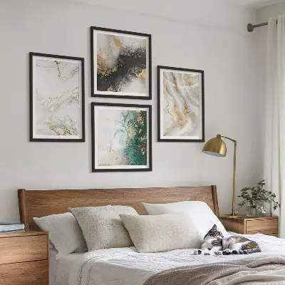 Multi-piece wall art set with abstract patterns in white black and green