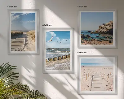 Multi-piece wall decor set with beach, sand, waves, sky, and birds