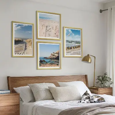 Multi-piece wall decor set with beach, sand, waves, sky, and birds