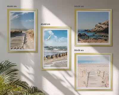 Multi-piece wall decor set with beach, sand, waves, sky, and birds