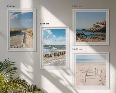 Multi-piece wall decor set with beach, sand, waves, sky, and birds