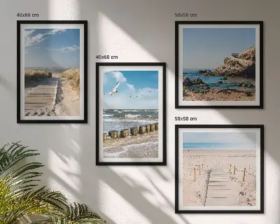 Multi-piece wall decor set with beach, sand, waves, sky, and birds
