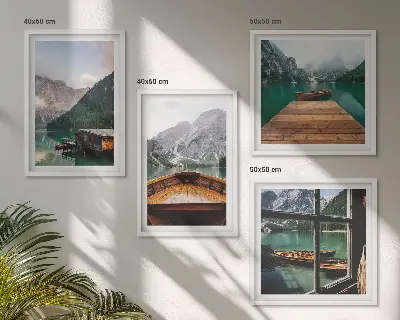 Multi-piece wall decor set featuring mountain landscapes, cottages, and boats