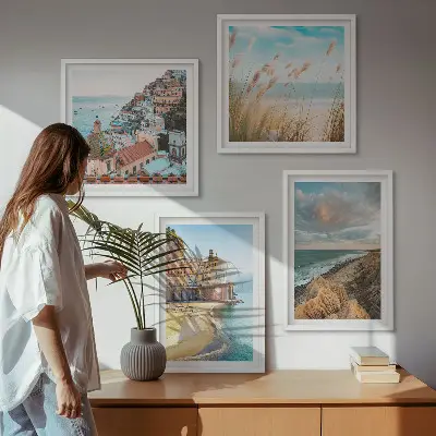 Set of 4 landscape wall art pieces featuring beach, city, and cliff scenes