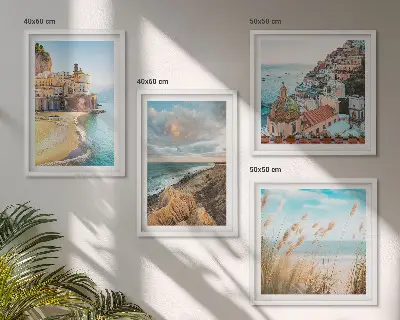 Set of 4 landscape wall art pieces featuring beach, city, and cliff scenes