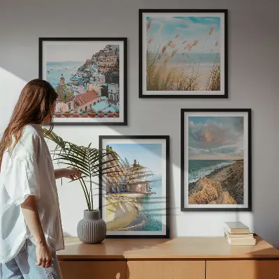 Set of 4 landscape wall art pieces featuring beach, city, and cliff scenes