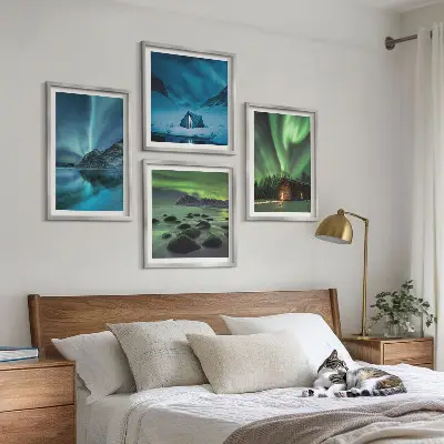 Wall art set featuring winter landscapes of aurora over mountains