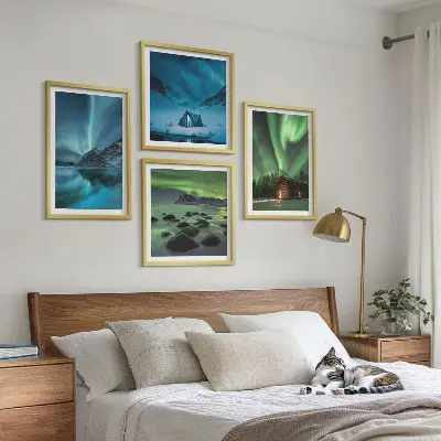 Wall art set featuring winter landscapes of aurora over mountains
