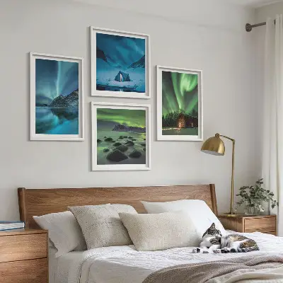 Wall art set featuring winter landscapes of aurora over mountains