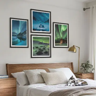 Wall art set featuring winter landscapes of aurora over mountains