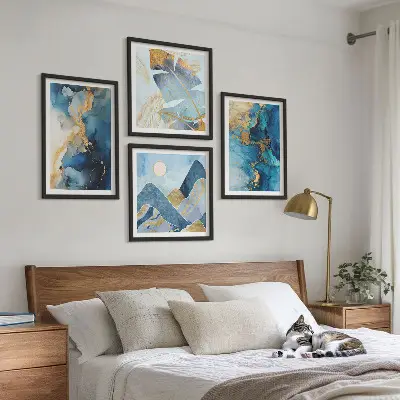 Multi-piece wall decor set with blue mountains and gold patterns
