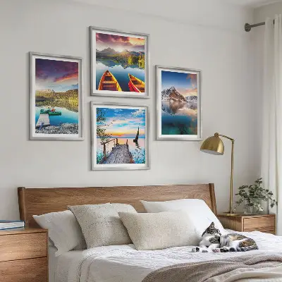 Wall art set featuring a landscape of lakes, mountains, and a boat