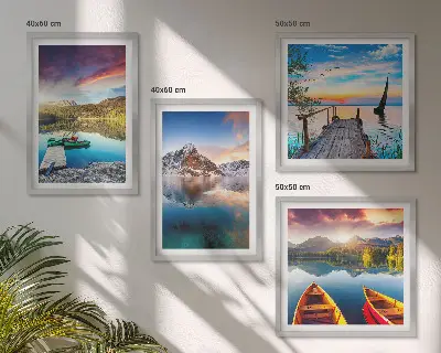 Wall art set featuring a landscape of lakes, mountains, and a boat