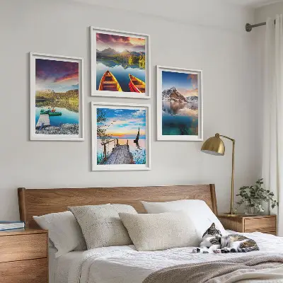 Wall art set featuring a landscape of lakes, mountains, and a boat