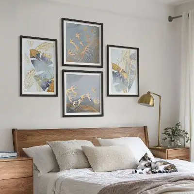 Set of 4 wall art pieces blue and beige leaves on a neutral background