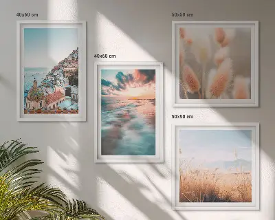 Multi-piece wall decor set featuring a seaside sunset with houses and flowers