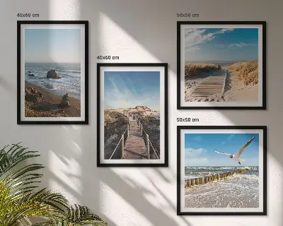 Set of 4 wall art pieces featuring beach waves and a pier under the sky