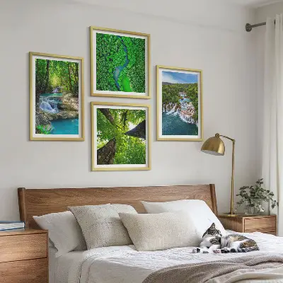 Multi-piece wall decor set featuring waterfalls in a green forest