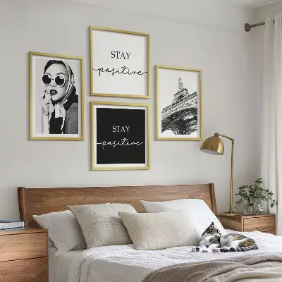 Wall art set featuring portraits of the Eiffel Tower and slogans