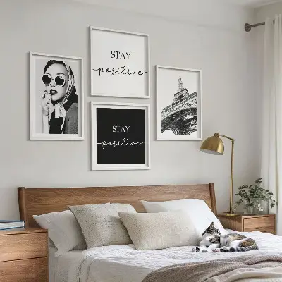 Wall art set featuring portraits of the Eiffel Tower and slogans