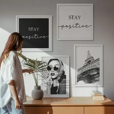 Wall art set featuring portraits of the Eiffel Tower and slogans