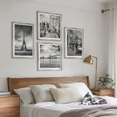 Set of 4 wall art pieces featuring city views of bridges, the Eiffel Tower, and a car