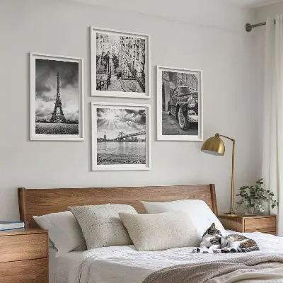 Set of 4 wall art pieces featuring city views of bridges, the Eiffel Tower, and a car
