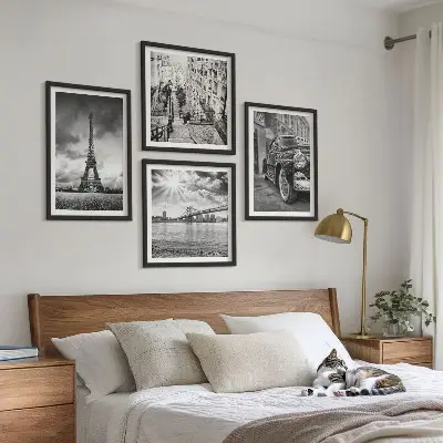 Set of 4 wall art pieces featuring city views of bridges, the Eiffel Tower, and a car