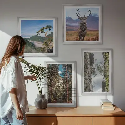 Set of 4 wall art pieces featuring a road through a forest with mountains and deer