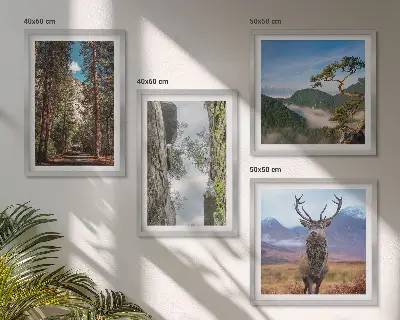 Set of 4 wall art pieces featuring a road through a forest with mountains and deer