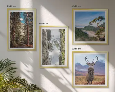 Set of 4 wall art pieces featuring a road through a forest with mountains and deer