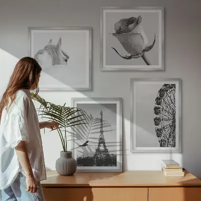 Wall art set featuring a rose, Eiffel Tower, horse, and Ferris wheel in black and white