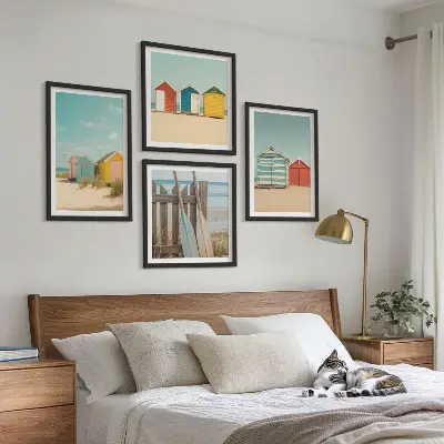 Multi-piece wall decor set featuring colorful beach houses and sun
