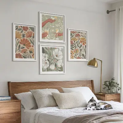 Wall art set with floral patterns in orange and green