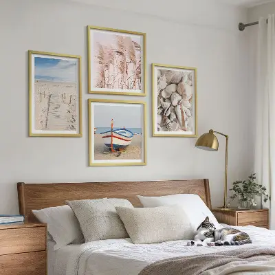 Multi-piece wall decor set featuring a beach boat shells and grass boho theme