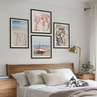 Multi-piece wall decor set featuring a beach boat shells and grass boho theme