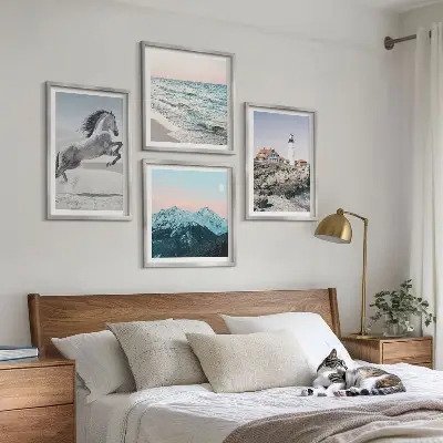 Set of 4 wall art pieces featuring horses in motion, a beach, a lighthouse, and mountains
