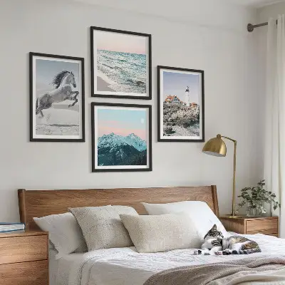Set of 4 wall art pieces featuring horses in motion, a beach, a lighthouse, and mountains