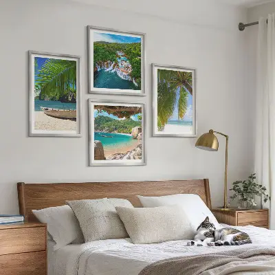 Multi-piece landscape wall art set featuring beach, boat, waterfall, and palm tree scenery