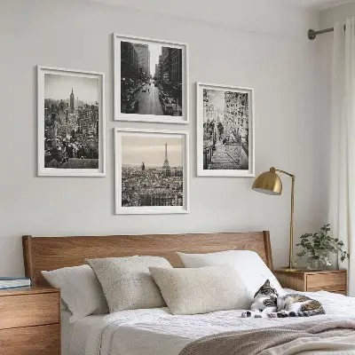 Wall art set featuring views of stairs in Paris and New York