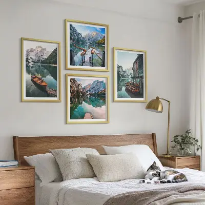 Wall art set featuring a lake with mountains, boats, and a cottage