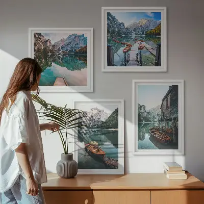Wall art set featuring a lake with mountains, boats, and a cottage