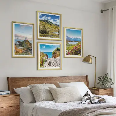 Set of 4 wall art pieces featuring beach, lighthouse, mountain, and meadow flower scenes