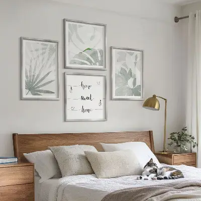 Wall art set with greenish-gray plant leaves