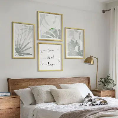 Wall art set with greenish-gray plant leaves