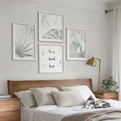 Wall art set with greenish-gray plant leaves
