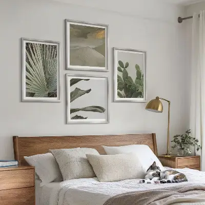 Set of 4 tropical plant wall art pieces pastel leaves design