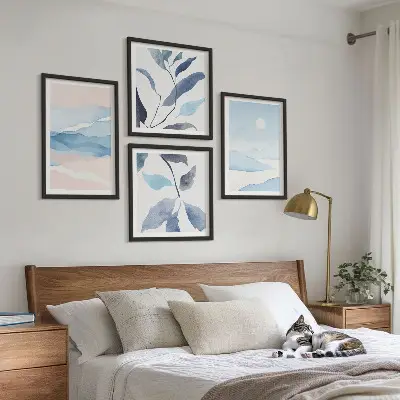 Multi-piece wall decor set featuring watercolor mountain landscapes and plants